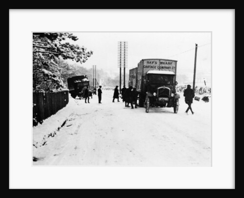 A Hay's Wharf Cartage Company Ltd van along a snowy A30, near Basingstoke, Hampshire, 1920s by Unknown