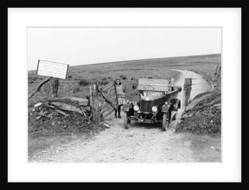 A Morris Bullnose driving through a gateway, early 1920s by Unknown