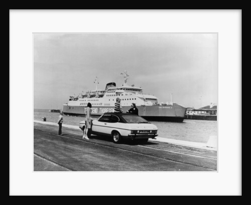 A 1974 Ford Capri on a quay, in front of a Townsend Thoresen car ferry, 1970s by Unknown