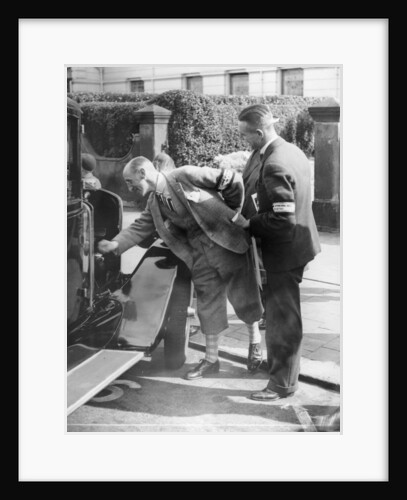 A judge inspecting a car at the Southport Rally, 1928 by Unknown