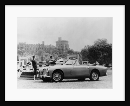 An Aston Martin DB2-4 MKII, with Windsor Castle in the background, 1956 by Unknown