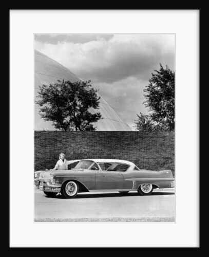 Woman with a 1957 Cadillac coupe de ville, (c1957?) by Unknown