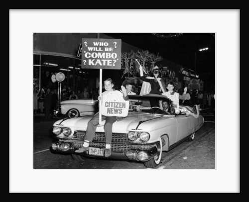 Fancy dress parade with a 1957 Cadillac, USA, (c1957?) by Unknown
