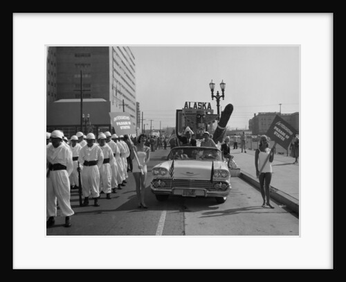 Models and a Cadillac on a parade, USA, (c1959?) by Unknown