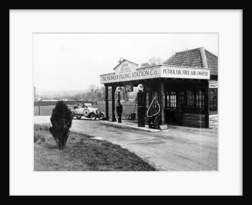 1923 10 hp Calcott arriving at a petrol station by Anonymous