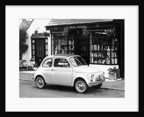 Fiat 500 parked outside a quaint shop, 1969 by Unknown