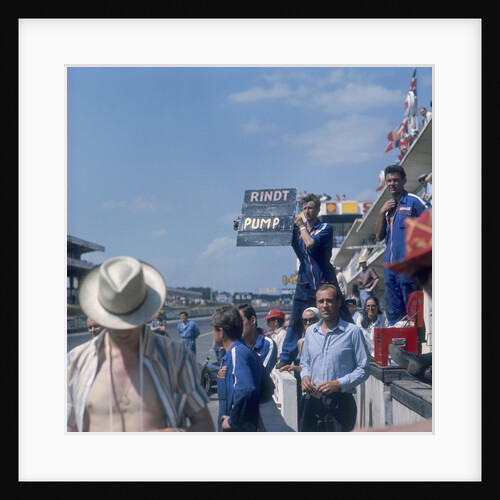 A mechanic holding up a sign, French Grand Prix, Le Mans, France, 1967 by Unknown