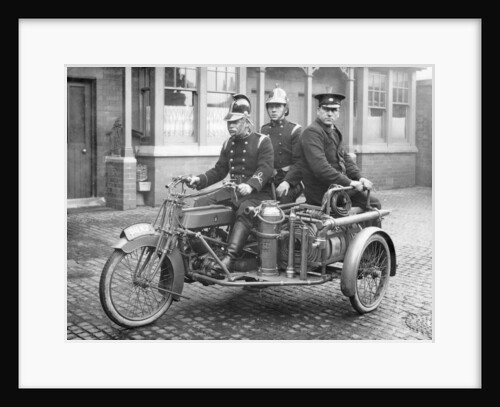 A Rex motorcycle being used by firemen by Unknown