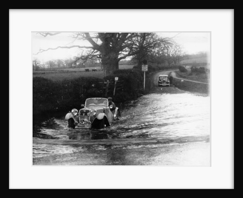 1935 Singer 1.5 Litre Le Mans taking part in a water splash trial, (1935?) by Unknown