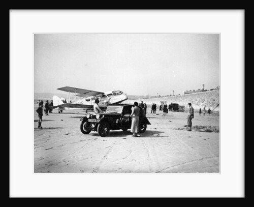 Riley Kestrel and a Dragon aircraft on a beach, 1934 by Unknown