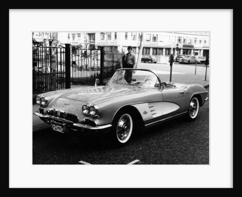 1961 Chevrolet Corvette on a parking meter, (c1961?) by Unknown
