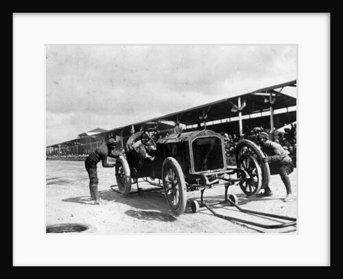 Changing the rims on a De Dietrich car, Coppa Florio Race, Italy, 1908 by Unknown
