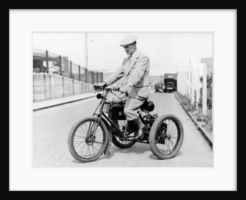An 1898 De Dion tricycle and rider by Anonymous