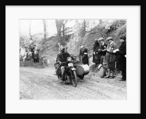 A competitor riding a Norton, competing in the Colmore Cup Trial, 1921 by Unknown