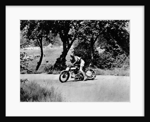 A man on a Norton bike taking part in the Belgian Grand Prix by Anonymous
