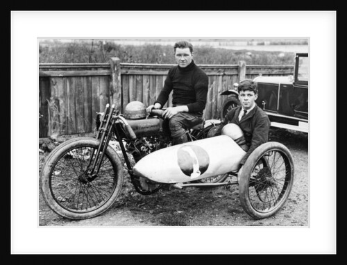 FW Dixon on a Harley-Davidson, with a passenger in the sidecar, 1921 by Unknown