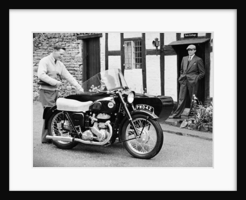 An Ariel VB 600cc with a sidecar by Anonymous