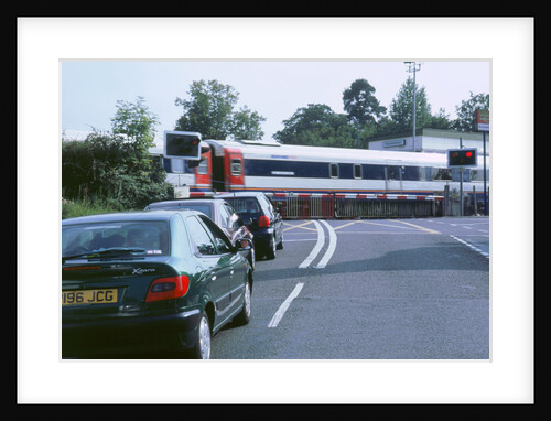 Traffic queue at level crossing in Brockenhurst, Hampshire by Unknown