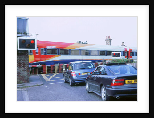 Traffic queue at level crossing in Brockenhurst, Hampshire by Unknown