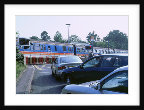 Traffic queue at level crossing in Brockenhurst, Hampshire by Unknown
