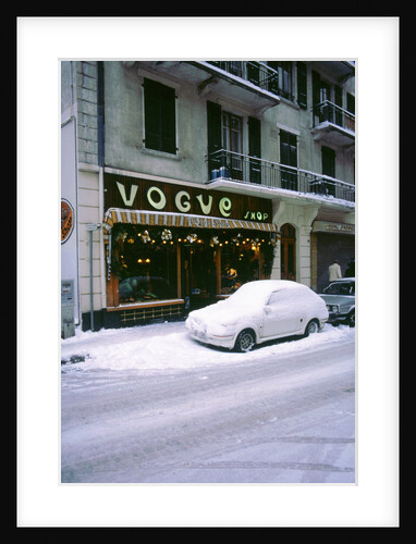 Car covered in snow in French street by Unknown