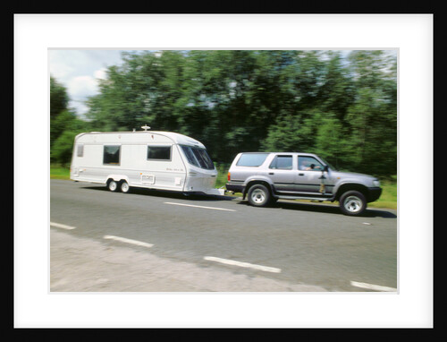 1995 Toyota Landcruiser towing large caravan at speed by Unknown