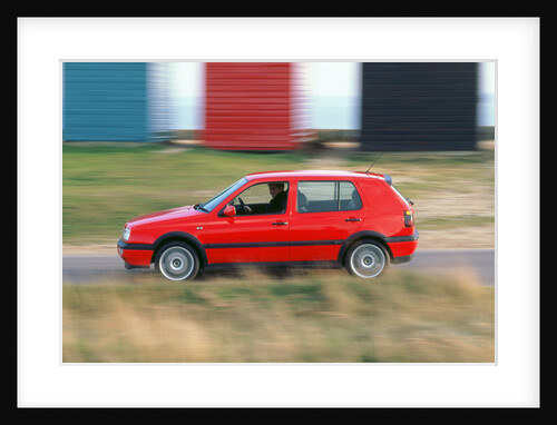 Man driving 1996 Vokswagen Golf Gti by Unknown