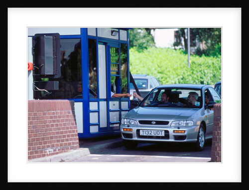 Subaru using toll booth on Itchen bridge, Southampton by Unknown