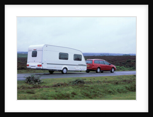 2002 Citroen C5 towing a caravan by Unknown