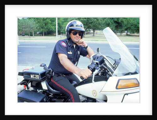 Policeman on 1994 Harley Davidson, Austin Texas by Unknown