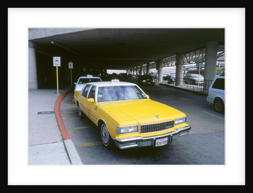 Yellow taxi cab at airport by Unknown