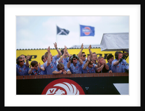 Nissan team celebrate victory 1998 British touring cars. by Unknown