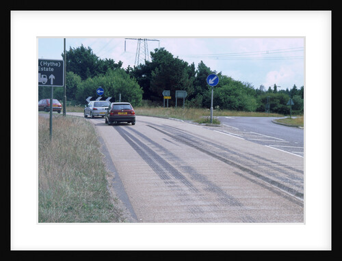 Tyre skidmarks on road surface by Unknown