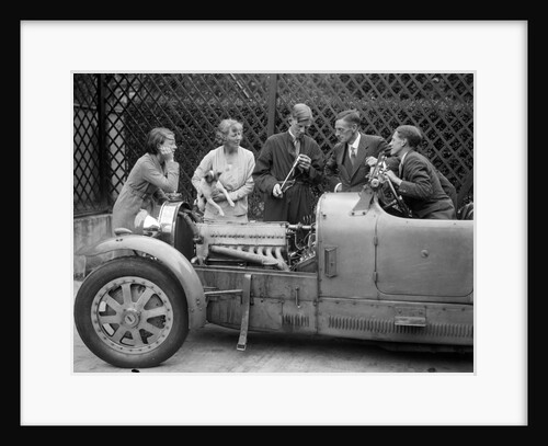 Denis Evans inspecting the plugs of his Bugatti Type 43 2262cc by Bill Brunell