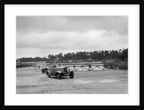 J Cleland's Ford V8 and JH Barker's Riley Lynx at the chicane, JCC Members Day, Brooklands, 1939 by Bill Brunell