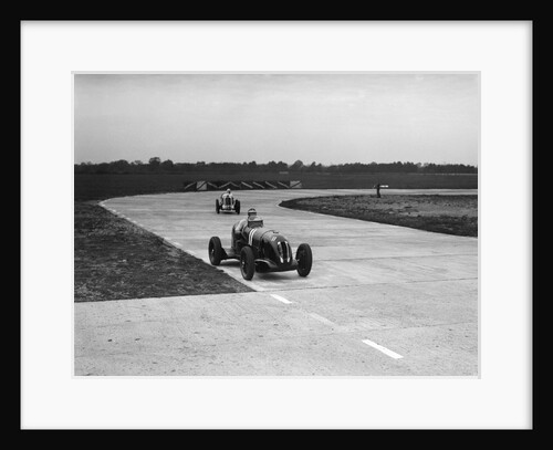 Rapier Special Racing single seater leading a MG in a race on the Campbell Circuit at Brooklands by Bill Brunell