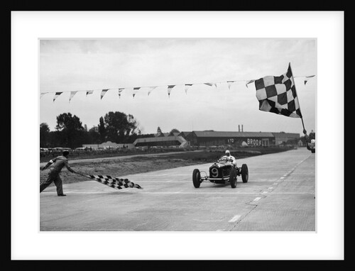 Alfa Romeo taking the chequred flag in a race at Brooklands by Bill Brunell