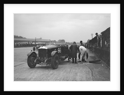 GL Baker's 5954 cc Minerva undergoing a rear wheel change at Brooklands by Bill Brunell