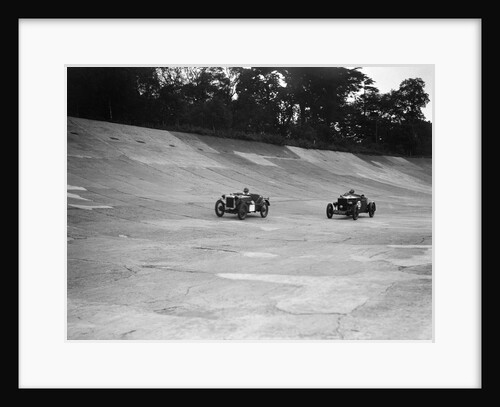 Austin Ulster leading a Windsor on the banking at Brooklands by Bill Brunell
