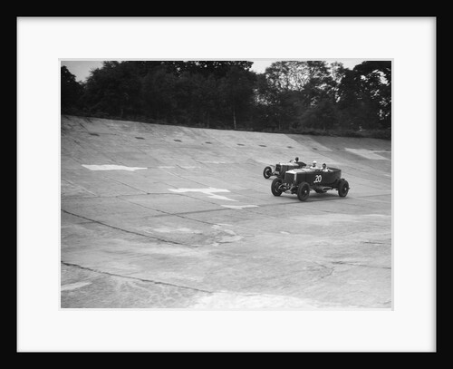 GL Baker's 5954 cc Minerva racing a 1930 Frazer-Nash Sportop on the banking at Brooklands by Bill Brunell
