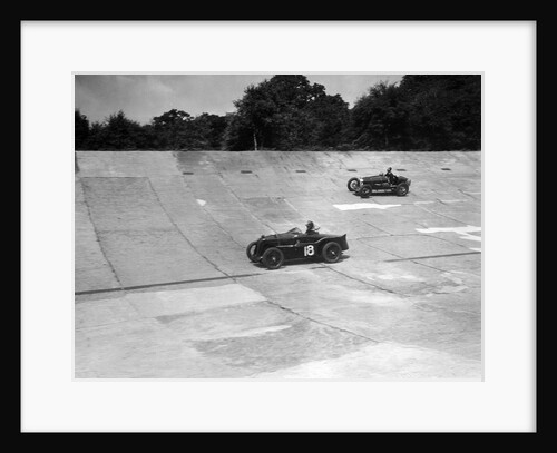 MG C type and Amilcar C6 racing on the banking at Brooklands by Bill Brunell