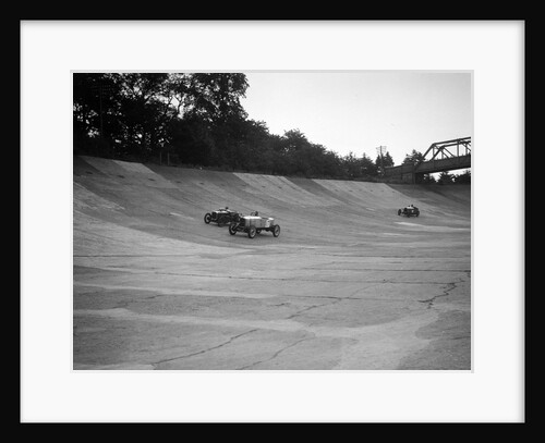Alvis 17 and Austin 747 cc racing on the banking at Brooklands by Bill Brunell