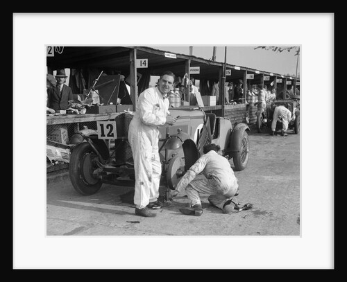 Mechanic working on a Talbot 105 at the JCC Double Twelve race, Brooklands, 8/9 May 1931 by Bill Brunell