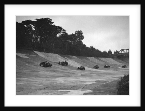 Cars racing on the banking at a JCC Members Day, Brooklands by Bill Brunell