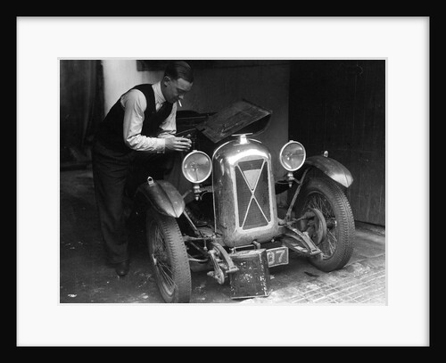 Geoffrey Baker working on a Salmson 1090cc car by Bill Brunell