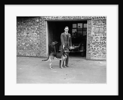 Geoffrey Baker and his alsatian by Bill Brunell