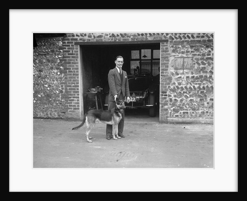Geoffrey Baker and his alsatian by Bill Brunell