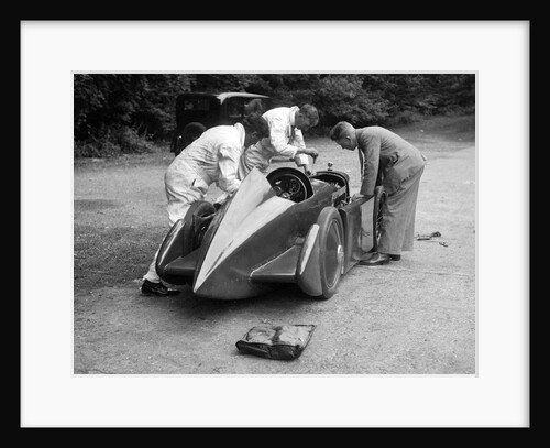 Mechanics working on Leon Cushman's Austin 7 racer for a speed record attempt, Brooklands, 1931 by Bill Brunell