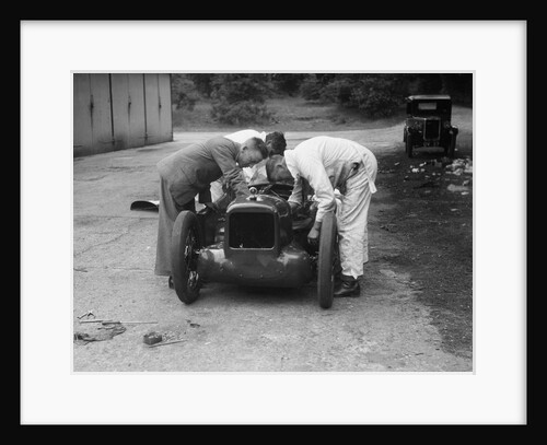 Mechanics working on Leon Cushman's Austin 7 racer for a speed record attempt, Brooklands, 1931 by Bill Brunell