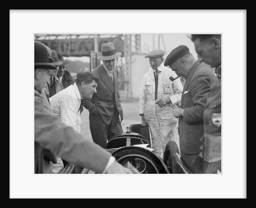 People examining Leon Cushman's Austin 7 racer at Brooklands for a speed record attempt, 1931 by Bill Brunell
